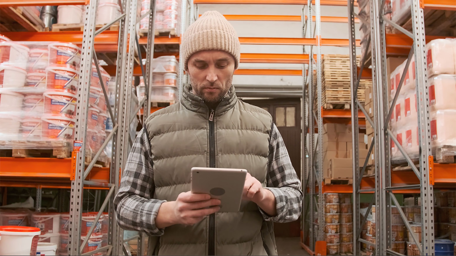 Food supply chain manager reviewing real-time visibility data in eP360